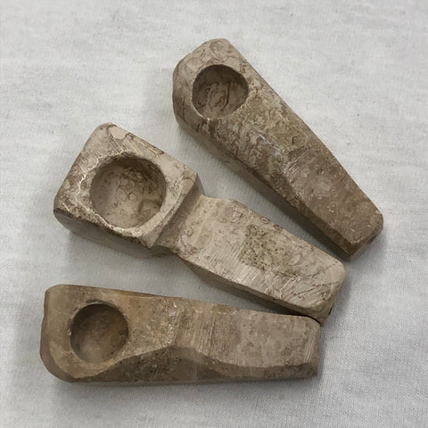 Brown and White Stone Pipe